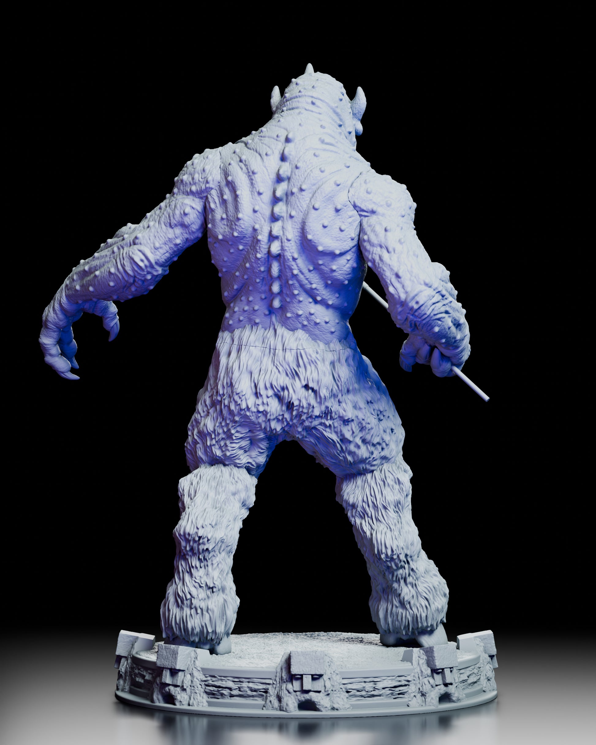 Rear view of The Cyclops maquette from The 7th Voyage of Sinbad showing muscular back anatomy, reptilian skin textures, fur-covered legs, and scenic display base